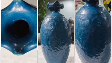 定窑卷草纹饰花口瓶